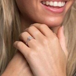 Chisholm Hunter Platinum Oval Cut 0.60ct Diamond Halo Solitaire Ring -Chisholm Hunter 1 001 22 0018 platinum oval cut 0.60ct diamond halo solitaire ring 1