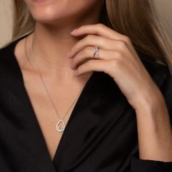 Chisholm Hunter 9ct White Gold Brilliant Cut Diamond 0.31ct Open Pear Shape Pendant 9 Chisholm Hunter 9ct White Gold Brilliant Cut Diamond 0.31ct Open Pear Shape Pendant -Chisholm Hunter 1 010 04 0238 ring 15 119 15 0211 pendant lifestyle