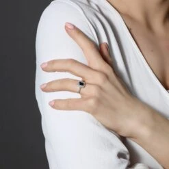 Chisholm Hunter 18ct White Gold Emerald Cut Sapphire 1.12ct Diamond Double Halo Ring 10 Chisholm Hunter 18ct White Gold Emerald Cut Sapphire 1.12ct Diamond Double Halo Ring -Chisholm Hunter 13 110 01 0229 lifestyle