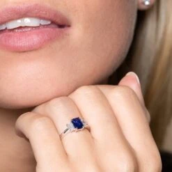 Chisholm Hunter 18ct White Gold Emerald Cut 1.12ct Sapphire And 0.43ct Diamond Three Stone Ring -Chisholm Hunter 13 110 05 0055 om 1 1