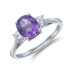 Chisholm Hunter Platinum Oval Cut 1.94ct Purple Sapphire And 0.34ct Diamond Three Stone Ring