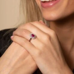 Chisholm Hunter 18ct White Gold 0.75ct Oval Cut Ruby And 0.32ct Halo Diamond Ring -Chisholm Hunter 13 111 01 0117 b 1