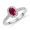 Chisholm Hunter 18ct White Gold Oval Cut 0.34ct Ruby And 0.49ct Diamond Halo Ring