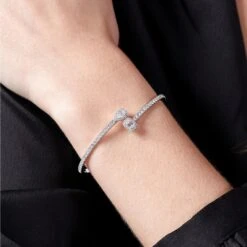 Chisholm Hunter 18ct White Gold Pear Emerald And Brilliant Cut 0.57ct Diamond Crossover Bangle -Chisholm Hunter 15 123 01 0046 om 2