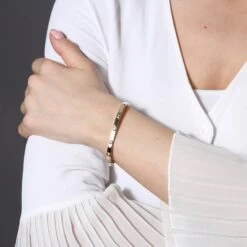 Chisholm Hunter 9ct Yellow Gold Baguette Cut 0.22ct Rectangular Diamond Bangle -Chisholm Hunter 15 123 04 0027 lifestyle