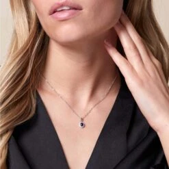 Chisholm Hunter 18ct White Gold 0.53ct Diamond And 0.17ct Sapphire Oval Halo Pendant 11 Chisholm Hunter 18ct White Gold 0.53ct Diamond And 0.17ct Sapphire Oval Halo Pendant -Chisholm Hunter 16 125 03 0081 om 2