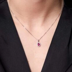 Chisholm Hunter 18ct White Gold 0.38ct Diamond And 0.17ct Ruby Oval Halo Pendant -Chisholm Hunter 16 126 03 0041 om 1