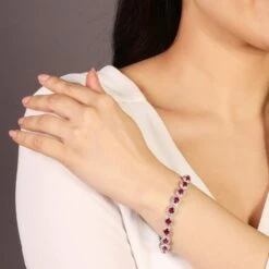 Chisholm Hunter 18ct White Gold Oval Cut Ruby 16.05ct Diamond Halo Bracelet -Chisholm Hunter 16 126 11 0014 lifestyle