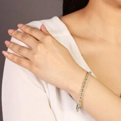 Chisholm Hunter 9ct Yellow Gold Round Brilliant Cut Emerald And Diamond Bracelet -Chisholm Hunter 16 127 10 0001 lifestyle