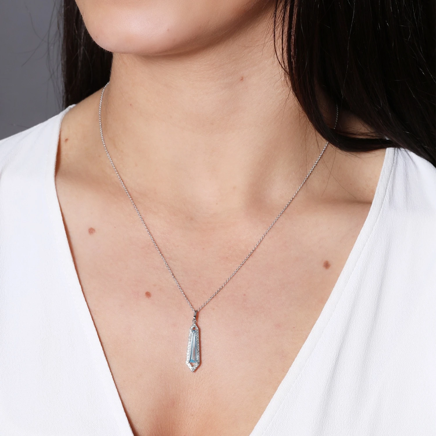 Chisholm Hunter 9ct White Gold Tapered Baguette Cut Topaz 16x4x2 Diamond Halo Pendant 4 Chisholm Hunter 9ct White Gold Tapered Baguette Cut Topaz 16x4x2 Diamond Halo Pendant - Image 2