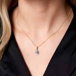 Chisholm Hunter 9ct Yellow Gold Pear Cut Aquamarine And 0.04ct Diamond Halo Pendant -Chisholm Hunter 16 131 02 0002 1 1