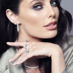 Chisholm Hunter 18ct While Gold Brilliant Cut 3.00ct Diamond Stud Earrings 12 Chisholm Hunter 18ct While Gold Brilliant Cut 3.00ct Diamond Stud Earrings -Chisholm Hunter green suit 6 1